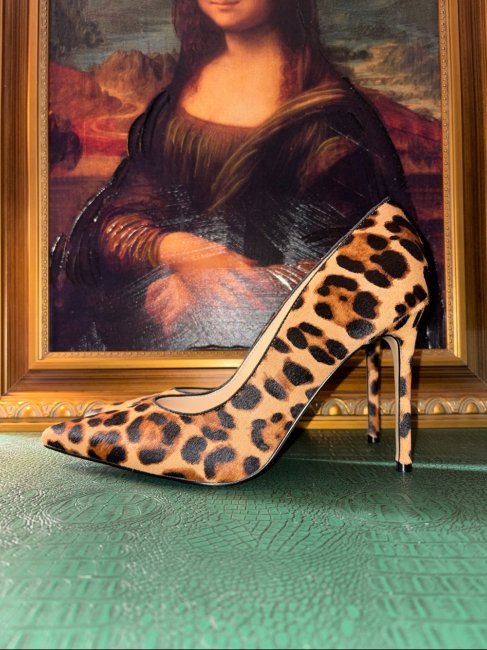 Nine West leopard print calf hair pointed-toe pumps with 4.5” stiletto heel